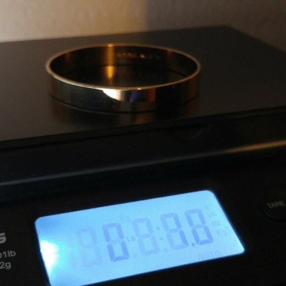 Anne Klein Solid Gold Tone Bangle Bracelet, 7 3/4 Inches, Very Reflective - Picture 8 of 8